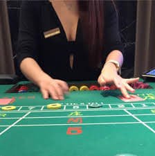 Filipino player accessing a77 live casino on a mobile phone